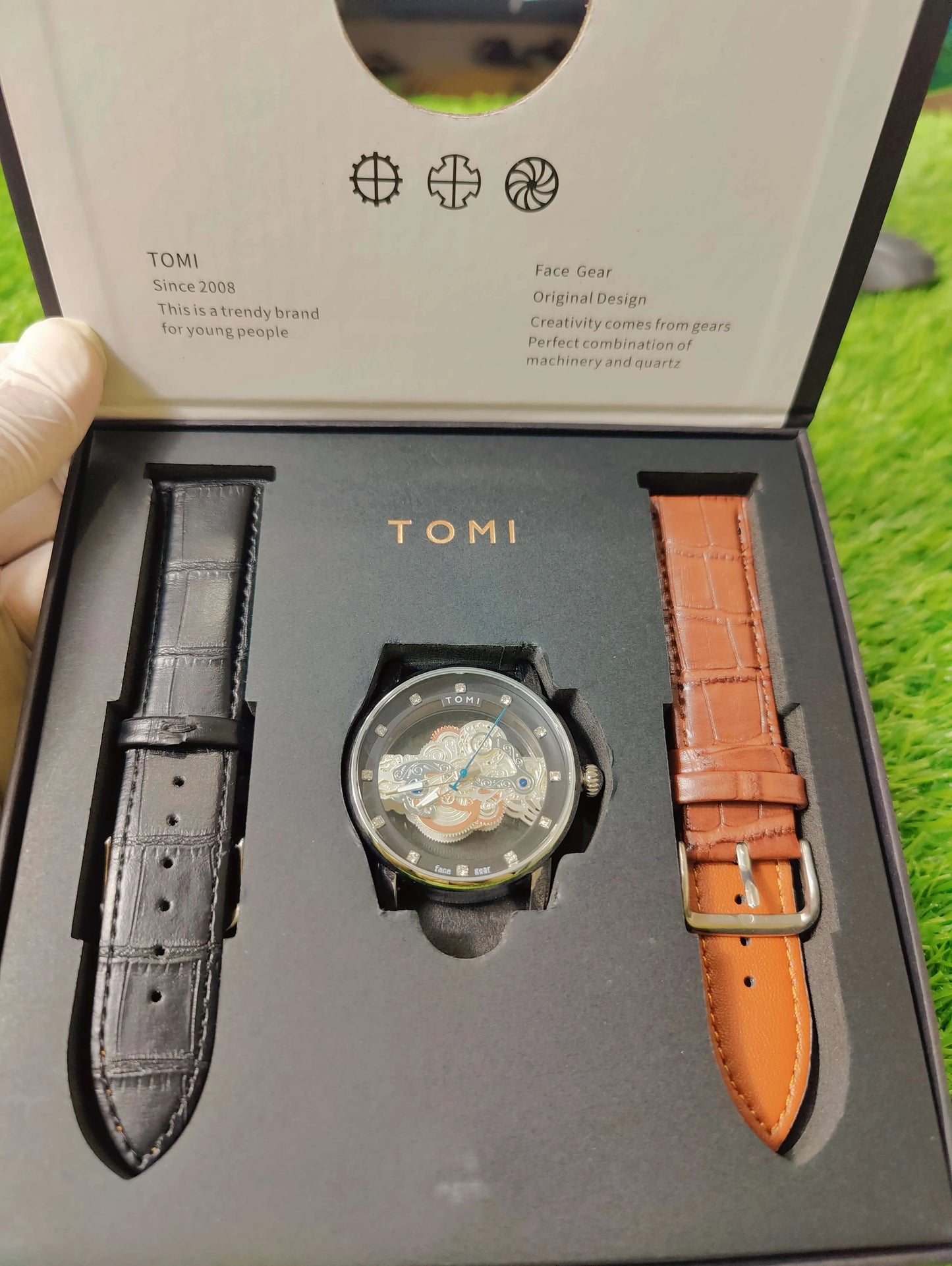 Transparent dial TOMI quartz watch with black and brown straps – Pakistan