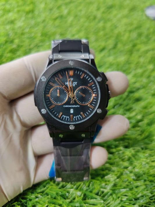 Hublot Geneve chronograph with black skeleton dial and stainless steel chain