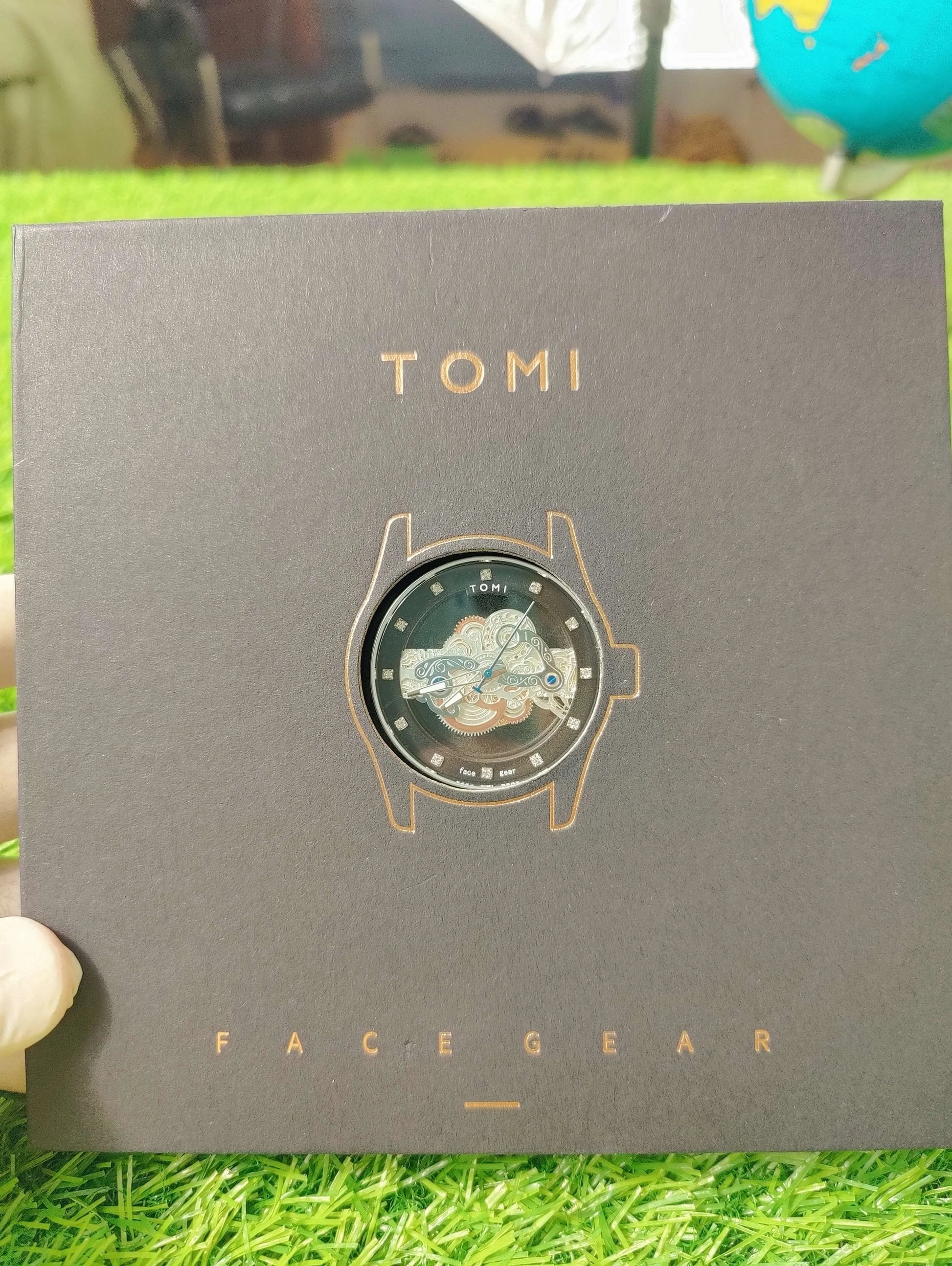 New TOMI dual-strap wristwatch in black box