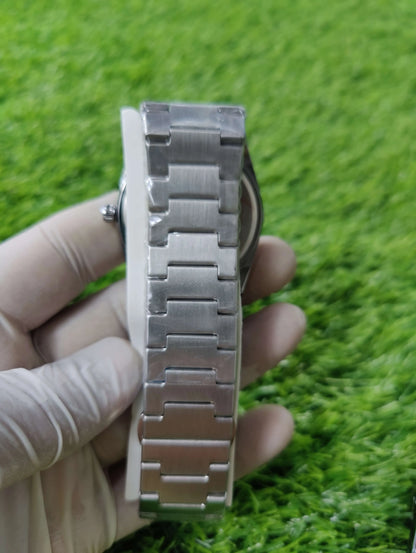 New Tissot PRX watch with stainless steel strap in black box