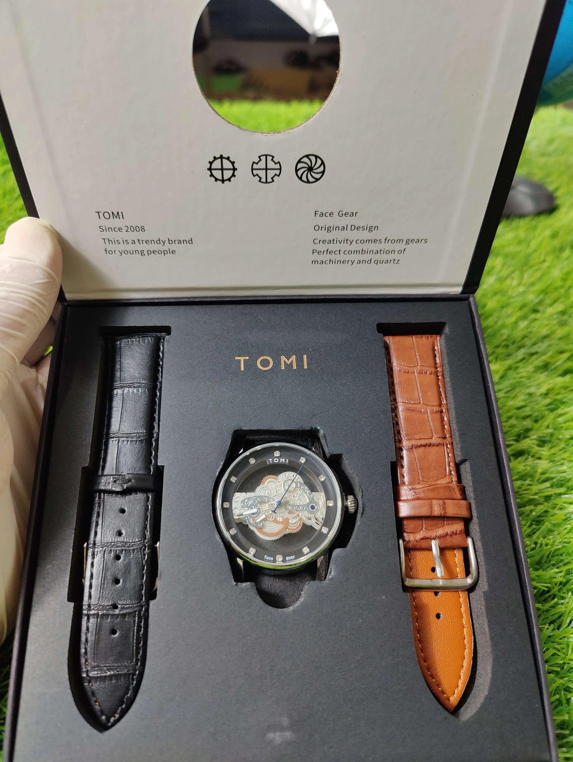Transparent dial TOMI quartz watch with black and brown straps – Pakistan