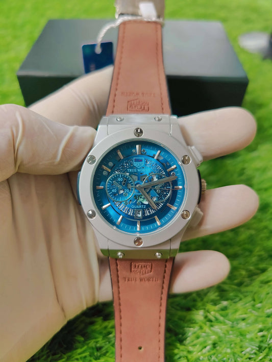 True Worth automatic watch with blue dial and bronze leather strap